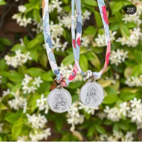 Acrylic necklace with Virgin Mary design